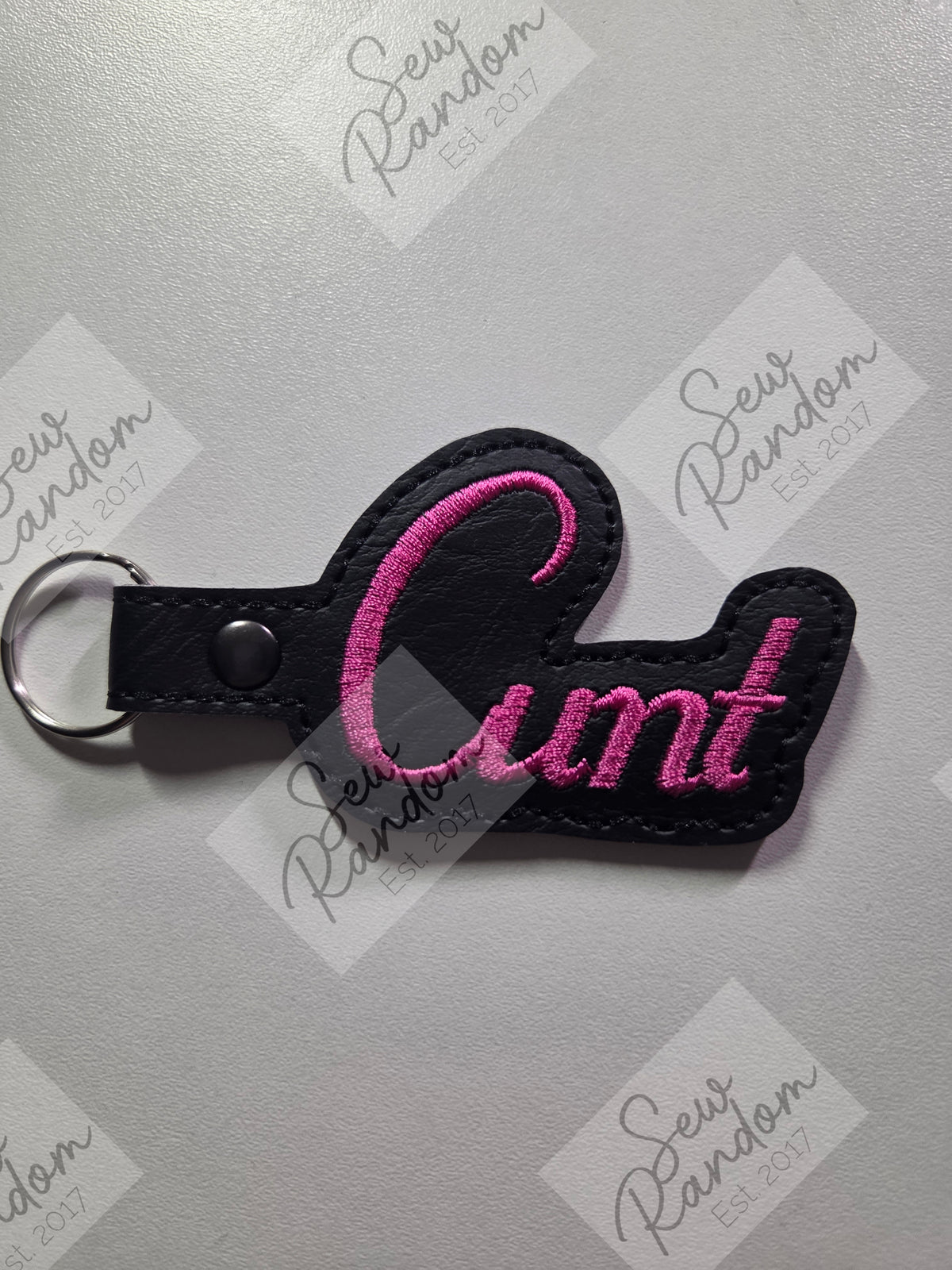 C WORD KEYRING - BLACK/PINK