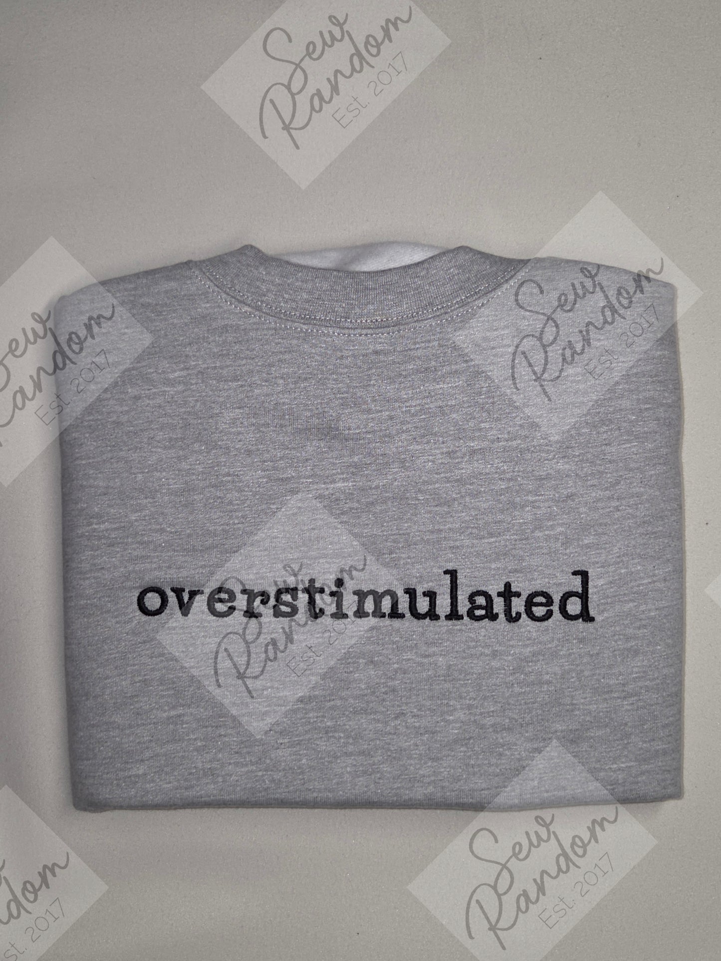 OVERSTIMULATED EMBROIDERED SWEATSHIRT/HOODIE