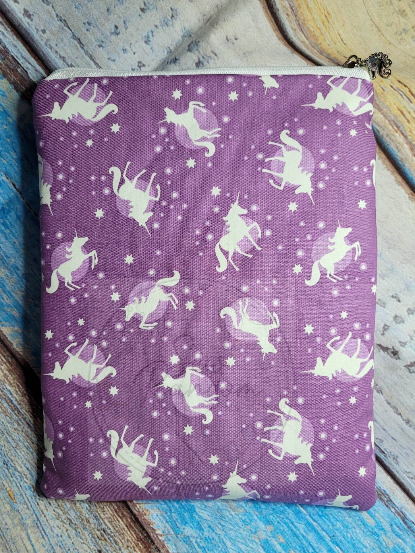 UNICORN GLOW IN THE DARK BOOK SLEEVE - PURPLE