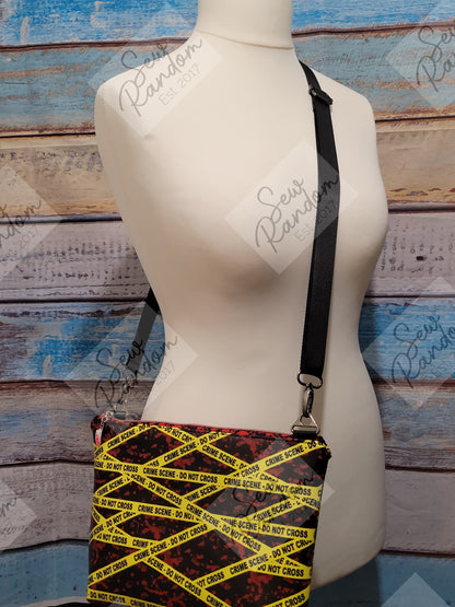 CRIME SCENE CROSSBODY BAG