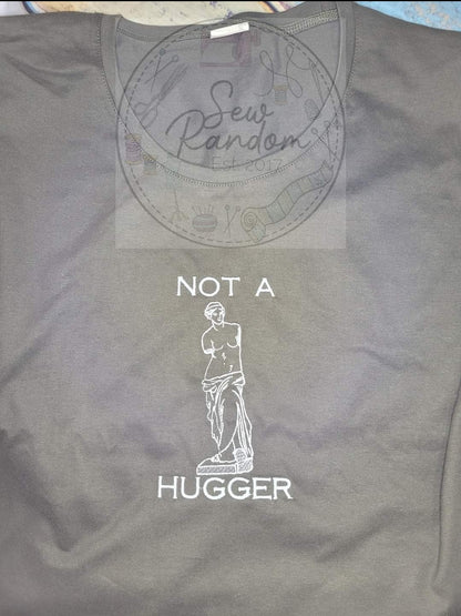 NOT A HUGGER LADIES T SHIRT