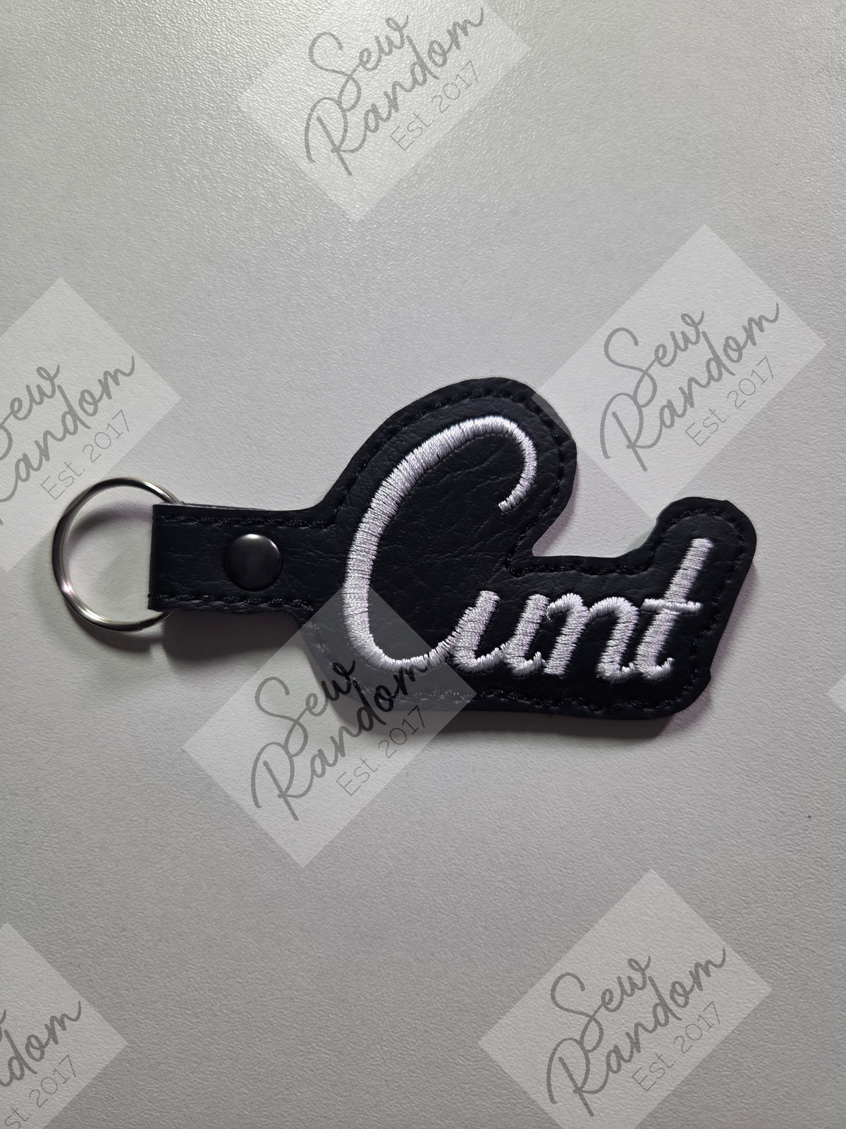 C WORD KEYRING - BLACK/WHITE