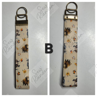 HAPPY COOS WRISLET KEYRING