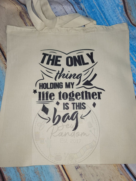 HOLDING TOGETHER TOTE BAG