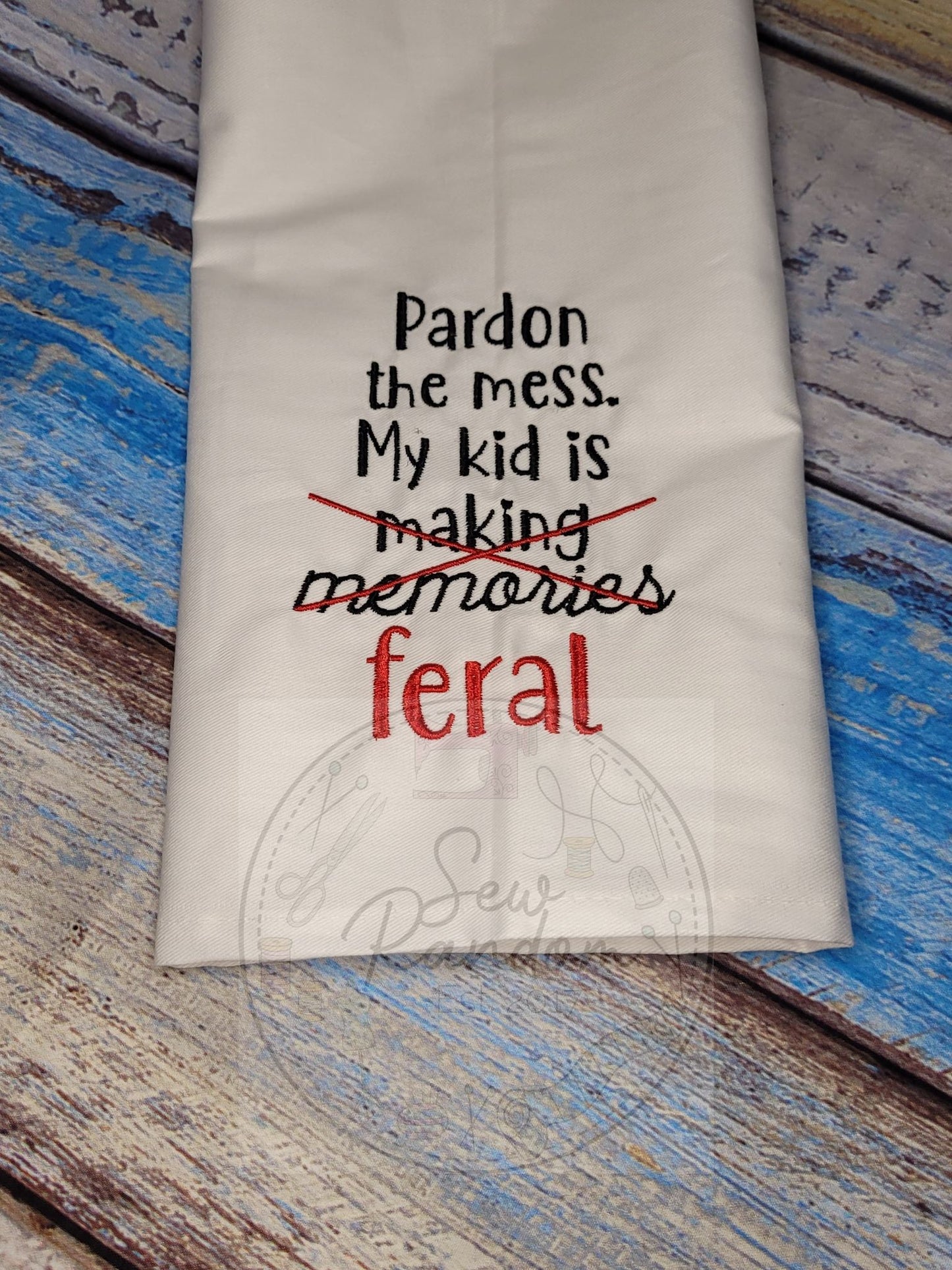 KID IS FERAL TEA TOWEL