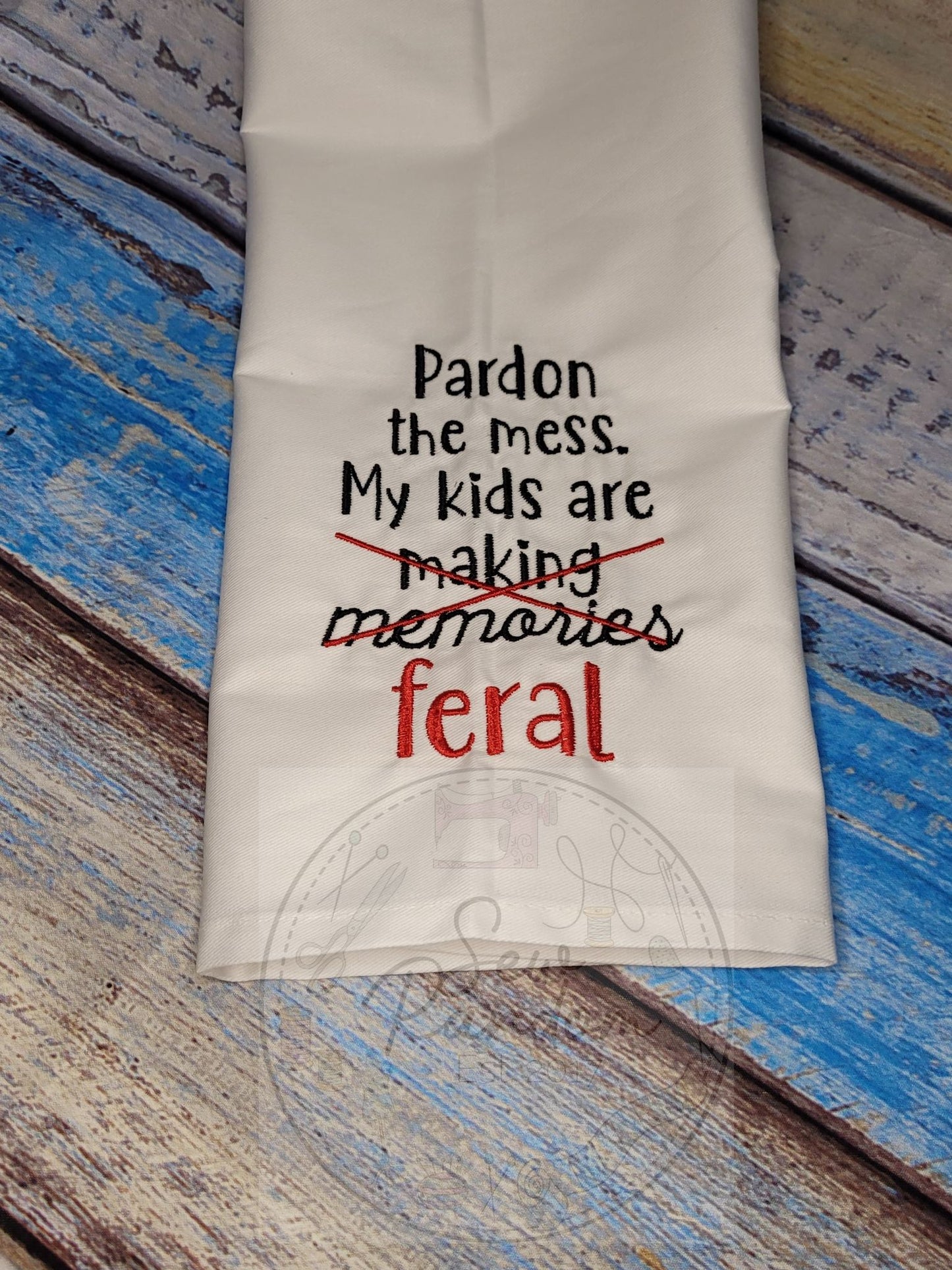 KIDS ARE FERAL TEA TOWEL