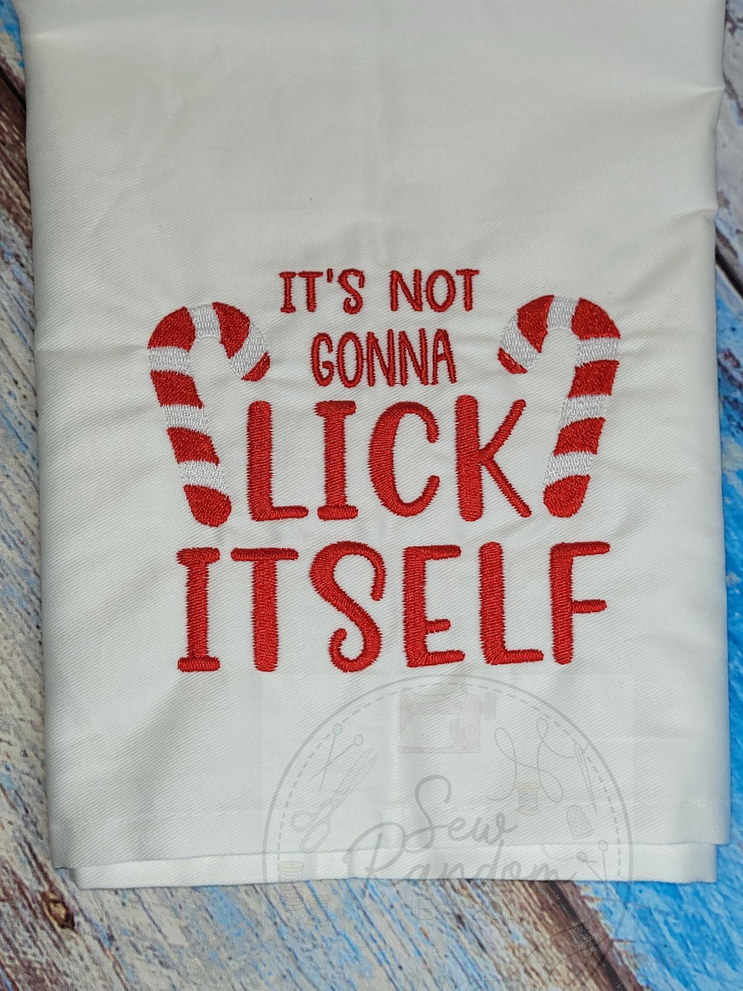 LICK ITSELF TEA TOWEL