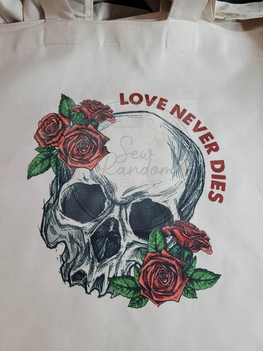 LOVE NEVER DIES TOTE BAG